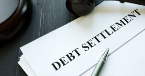 What Is Debt Settlement?
Debt settlement, also referred to as legal debt resolution, is the process of negotiating a speedy and affordable debt reduction with your creditors. Not only does debt settlement aim to pay off the exorbitant interest rates that commonly accompany minimum payments, but it also aims to reduce the principal amount of your debt.
Debt settlement is more than a straightforward scheme or initiative. It's an aggressive and specialized financial plan meant to successfully pay off debt. We can help you get debt-free sooner and save more money than alternative repayment choices by negotiating directly with your creditors.